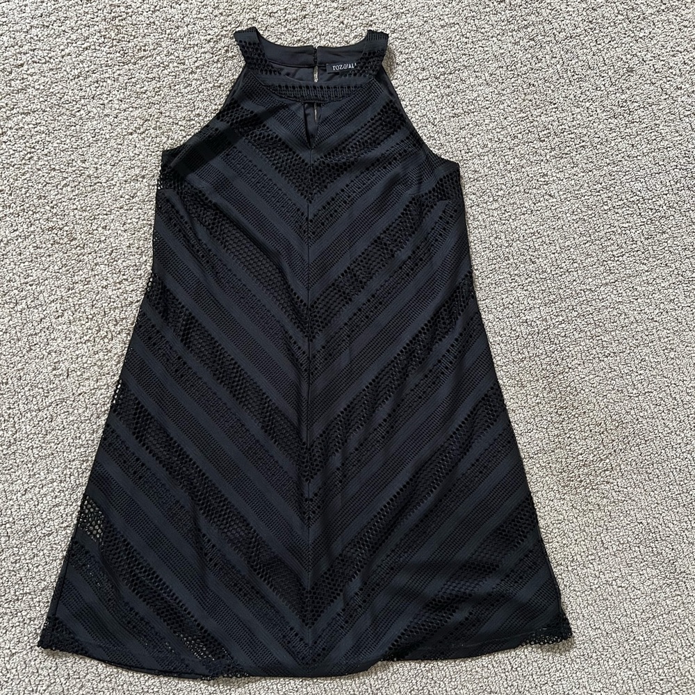 Black dress with peep hole neckline